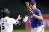 Texas Rangers' Nathaniel Lowe avoids colliding with Arizona Diamondbacks' Alek Thomas (5) after forcing him out during the third inning of a baseball game, Monday, Aug. 21, 2023, in Phoenix. (AP Photo/Matt York)
