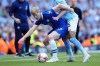 FILE - Chelsea's Lewis Hall, left, is challenged by Manchester City's Riyad Mahrez during the English Premier League soccer match between Manchester City and Chelsea at the Etihad Stadium in Manchester, England, May 21, 2023. Chelsea has loaned out of one of its most talented academy prospects amid another transfer window of big spending by the Premier League club. Lewis Hall, an 18-year-old left back, joined Newcastle on Tuesday Aug. 22, 2023, on a season-long loan deal that includes an obligation for the Saudi-controlled northeast club to make the transfer permanent based on performance-related criteria. (AP Photo/Jon Super, File)