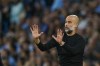 Manchester City's head coach Pep Guardiola gives instructions to his players during the English Premier League soccer match between Manchester City and Newcastle at the Etihad stadium in Manchester, England, Saturday, Aug. 19, 2023. (AP Photo/Dave Thompson)