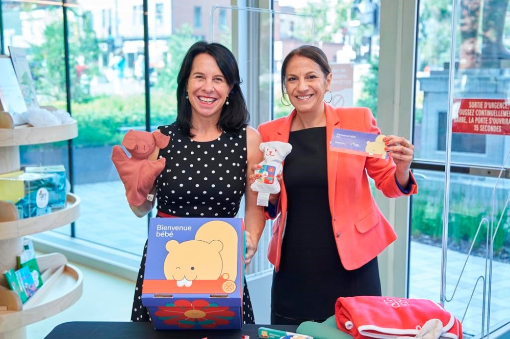 Montreal Mayor Valérie Plante and city councillor Despina Sourias (right) display items from boxes of free baby toys and supplies that will be given out to every family in the city with a new infant starting next year. The so-called Welcome Baby boxes will be available in 45 city libraries as of Jan. 1, 2024, for newborns, new arrivals and adopted children up to one year old. THE CANADIAN PRESS/HO-City of Montreal
