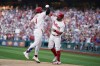 Philadelphia Phillies' Bryce Harper, left, and Kyle Schwarber celebrate after Harper's two-run home run during the first inning of a baseball game against the San Francisco Giants, Tuesday, Aug. 22, 2023, in Philadelphia. (AP Photo/Matt Slocum)