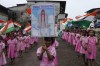 Children wave Indian flags at their school premises in Mumbai, India as they cheer for the successful landing of India’s moon craft Chandrayaan-3, on the moon surface, Tuesday, Aug.22, 2023. India’s previous attempt to land a robotic spacecraft near the moon’s little-explored south pole ended in failure in 2019. (AP Photo/ Rajanish Kakade)