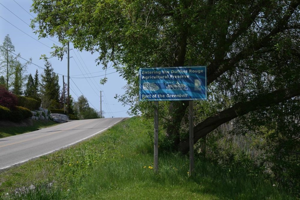 A sign marks an entry point into the Duffins Rouge Agricultural Preserve, part of Ontario's Greenbelt , on Monday, May 15, 2023, THE CANADIAN PRESS/Chris Young