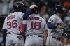 Boston Red Sox's Adam Duvall (18) is congratulated by Triston Casas (36) after hitting a three-run home run against the Houston Astros during the 10th inning of a baseball game Wednesday, Aug. 23, 2023, in Houston. (AP Photo/Kevin M. Cox)