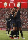 Real Madrid's Jude Bellingham, right, celebrates with Dani Carvajal after scoring his side's second goal during a Spanish La Liga soccer match between Almeria and Real Madrid at the Power Horse Stadium in Almeria, Spain, Saturday, Aug. 19, 2023. (AP Photo/Fermin Rodriguez)