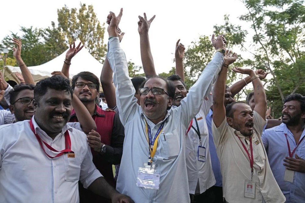 Indian Space Research Organization (ISRO) staff celebrate the successful landing of spacecraft Chandrayaan-3 on the moon at ISRO's Telemetry, Tracking and Command Network facility in Bengaluru, India, Wednesday, Aug. 23, 2023. India has landed a spacecraft near the moon's south pole, an unchartered territory that scientists believe could hold vital reserves of frozen water and precious elements, as the country cements its growing prowess in space and technology.(AP Photo/Aijaz Rahi)