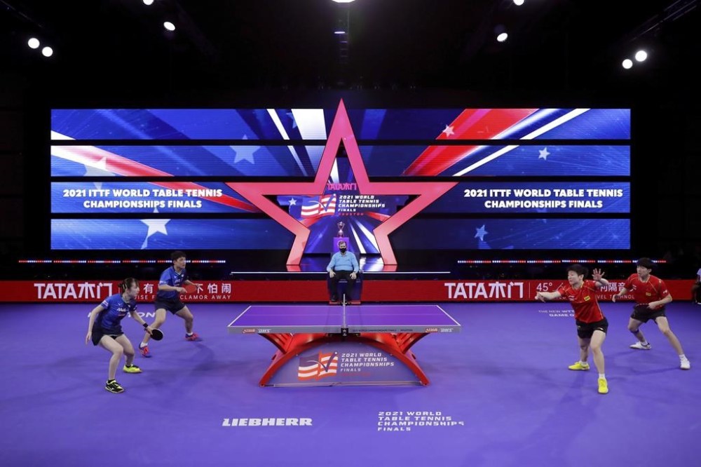 Japan's Hina Hayata and Tomokazu Harimoto,left, battle China's Chuqin Wang and Yingsha Sun, right, during the mixed doubles finals match during day six of the 2021 World Table Tennis Championships Sunday, Nov. 28, 2021, in Houston. The Canadian Table Tennis Championships scheduled for Sept. 22-24 in Hay River, N.W.T., have been cancelled due to the ongoing wildfire situation in the territory, Table Tennis North announced. THE CANADIAN PRESS/AP-Michael Wyke