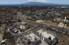A general view shows the aftermath of a devastating wildfire in Lahaina, Hawaii, Tuesday, Aug. 22, 2023. Two weeks after the deadliest U.S. wildfire in more than a century swept through the Maui community of Lahaina, authorities say anywhere between 500 and 1,000 people remain unaccounted for. (AP Photo/Jae C. Hong)