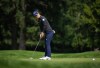 Yuka Saso, of Japan, makes a birdie putt on the seventh hole during the first round at the LPGA CPKC Canadian Women's Open golf tournament, in Vancouver, on Thursday, August 24, 2023. THE CANADIAN PRESS/Darryl Dyck