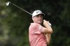 Keegan Bradley watches his shot on the second hole during the first round of the Tour Championship golf tournament at East Lake Golf Club, Thursday, Aug. 24, 2023, in Atlanta. (AP Photo/Alex Slitz)