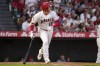 Los Angeles Angels' Shohei Ohtani heads to first during the as he lines out during the second inning in the second baseball game of a doubleheader against the Cincinnati Reds Wednesday, Aug. 23, 2023, in Anaheim, Calif. (AP Photo/Mark J. Terrill)