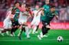 Leipzig's Yussuf Poulsen, left, and Stuttgart's Hiroki battle for the ball during the German Bundesliga soccer match between RB Leipzig and VfB Stuttgart at the Red Bull Arena in Leipzig, Germany, Friday, Aug. 25, 2023. (Jan Woitas/dpa via AP)