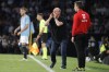 Celta's head coach Rafa Benitez, center, gives instructions during the Spanish La Liga soccer match between Celta Vigo and Real Madrid at the Balaidos stadium in Vigo, Spain, Friday, Aug. 25, 2023. (AP Photo/Lalo R. Villar)