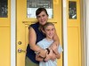 Dennie Fornwald, an early childhood educator, embraces her 10-year-old child, Kiké Dueck, in Regina on Aug. 24, 2023. Fornwald says she's upset with the Saskatchewan Party government's decision to require parental consent when children under 16 years old want to change their names or pronouns at school, as it would affect children, such as Dueck, who is nonbinary. THE CANADIAN PRESS/Jeremy Simes