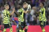 Arsenal players celebrate after winning the Premier League soccer match between Crystal Palace and Arsenal at Selhurst Park, in London, England, Monday, Aug. 21, 2023. (AP Photo/Kin Cheung)