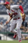 St. Louis Cardinals third baseman Nolan Arenado tries to pull in a base hit by Pittsburgh Pirates' Liover Peguero in the fourth inning of a baseball game in Pittsburgh, Wednesday, Aug. 23, 2023. (AP Photo/Matt Freed)