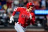 Los Angeles Angels' Shohei Ohtani, of Japan, runs for a double during the third inning of the team's baseball game against the New York Mets, Friday, Aug. 25, 2023, in New York. (AP Photo/Frank Franklin II)