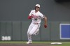 Minnesota Twins' Matt Wallner heads to third with a triple against the Texas Rangers during the first inning of a baseball game Friday, Aug. 25, 2023, in Minneapolis. (AP Photo/Stacy Bengs)