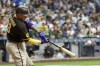 San Diego Padres' Manny Machado hits a home run during the fourth inning of a baseball game against the Milwaukee Brewers Friday, Aug. 25, 2023, in Milwaukee. (AP Photo/Morry Gash)