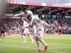 Tottenham Hotspur's Dejan Kulusevski, below, celebrates scoring their side's second goal of the game with teammate Son Heung-min during their English Premier League soccer match against Bournemouth at the Vitality Stadium, Bournemouth, England, Saturday, Aug. 26, 2023. (Adam Davy/PA via AP)