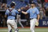 Tampa Bay Rays relief pitcher Jason Adam, right, celebrates with catcher Christian Bethancourt after the Rays defeated the New York Yankees during a baseball game Sunday, Aug. 27, 2023, in St. Petersburg, Fla. (AP Photo/Scott Audette)