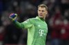 FILE - Bayern goalkeeper Manuel Neuer reacts during the Champions League, round of 16, second leg soccer match between Bayern and Salzburg in Munich, Germany, on March 8, 2022. Neuer has on Monday, Aug. 28, 2023 returned to training with Bayern Munich’s goalkeepers for the first time since breaking his leg in a ski accident in December. Bayern says in a statement that “the 37-year-old captain completed a session with his goalkeeping colleagues” and that he “has now taken the next step on the comeback trail.” (AP Photo/Matthias Schrader, File)