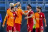 Galatasaray's Sergio Oliveira, center right, celebrates scoring with teammates during the playoff match for the Champions League soccer match between Molde and Galatasaray at Aker Stadion, Molde, Norway, Wednesday Aug. 23, 2023. (Svein Ove Ekornesvag/NTB via AP)