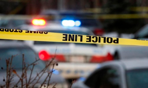 The directors of domestic violence research and prevention organizations say more Canadians should be aware of the signs someone they know may harm members of their own family. Police attend the scene of a multiple shooting in Calgary, Thursday, Jan. 1, 2015. THE CANADIAN PRESS/Jeff McIntosh