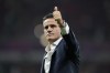 FILE - Canada's head coach John Herdman gestures at the end of the World Cup group F soccer match between Belgium and Canada, at the Ahmad Bin Ali Stadium in Doha, Qatar, Wednesday, Nov. 23, 2022. Herdman quit as coach of Canada's men's national team on Monday, Aug. 28, 2023, to move behind the bench at Toronto of Major League Soccer starting Oct. 1. (AP Photo/Natacha Pisarenko, File)