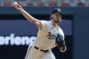 Minnesota Twins starting pitcher Bailey Ober throws to the Texas Rangers in the first inning of a baseball game, Sunday, Aug. 27, 2023, in Minneapolis. (AP Photo/Bruce Kluckhohn)