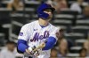 New York Mets' Brandon Nimmo hits a two-run home run against the Texas Rangers during the third inning of a baseball game on Monday, Aug. 28, 2023, in New York. (AP Photo/Adam Hunger)