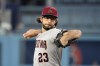Arizona Diamondbacks starting pitcher Zac Gallen throws to the plate during the first inning of a baseball game against the Los Angeles Dodgers Monday, Aug. 28, 2023, in Los Angeles. (AP Photo/Mark J. Terrill)