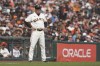 FILE - San Francisco Giants third base coach Ron Wotus watches the team's play against the San Diego Padres during a baseball game in San Francisco, Sept. 16, 2021. A lifetime in baseball brings many family sacrifices, and for longtime Giants coach Wotus that meant never seeing his mother on her birthday. Until Tuesday, Aug. 29, 2023, when he coordinated his scouting trip to see San Francisco's Double-A affiliate — the Richmond Flying Squirrels — around his mom's 87th birthday in Colchester, Conn. (AP Photo/Jeff Chiu, File)