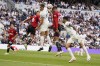 Tottenham's Micky van de Ven, centre, challenges for the ball with Manchester United's Raphael Varane, centre right, and Lisandro Martinez, centre left, during the Premier League soccer match between Tottenham Hotspur and Manchester United at the Tottenham Hotspur Stadium in London, England, Saturday, Aug. 19, 2023. (AP Photo/Alberto Pezzali)