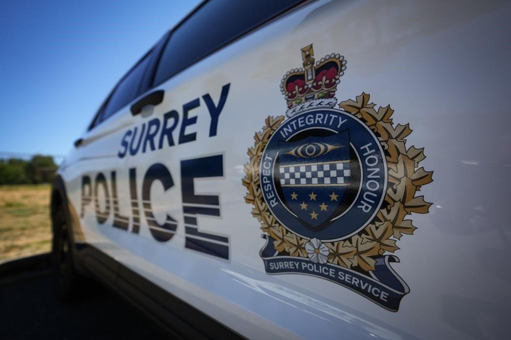 The Office of British Columbia's Police Complaint Commissioner has ordered a review of the case of a Surrey Police Service officer it says asked to be let off when he was caught driving while impaired. A Surrey Police crest is seen on the side of one of the force's vehicles in Surrey, B.C., on July 19, 2023. THE CANADIAN PRESS/Darryl Dyck