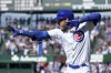 Chicago Cubs' Cody Bellinger celebrates his RBI single off Milwaukee Brewers relief pitcher Joel Payamps during the eighth inning of a baseball game Wednesday, Aug. 30, 2023, in Chicago. (AP Photo/Charles Rex Arbogast)