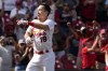 St. Louis Cardinals' Tommy Edman (19) celebrates after hitting a walk-off two-run home run defeat the San Diego Padres 5-4 in a baseball game Wednesday, Aug. 30, 2023, in St. Louis. (AP Photo/Jeff Roberson)