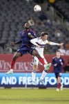 Chicago Fire's Ousmane Doumbia, left, and Vancouver Whitecaps' Ryan Gauld battle for a head ball during the first half of an MLS soccer game in Chicago, Wednesday, Aug. 30, 2023. (AP Photo/Nam Y. Huh)