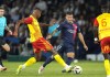 Lens' Andy Diouf, left, challenges for the ball with PSG's Lucas Hernandez during the French League One soccer match between Paris Saint-Germain and Lens at the Parc des Princes stadium in Paris, Saturday, Aug. 26, 2023. (AP Photo/Michel Euler)