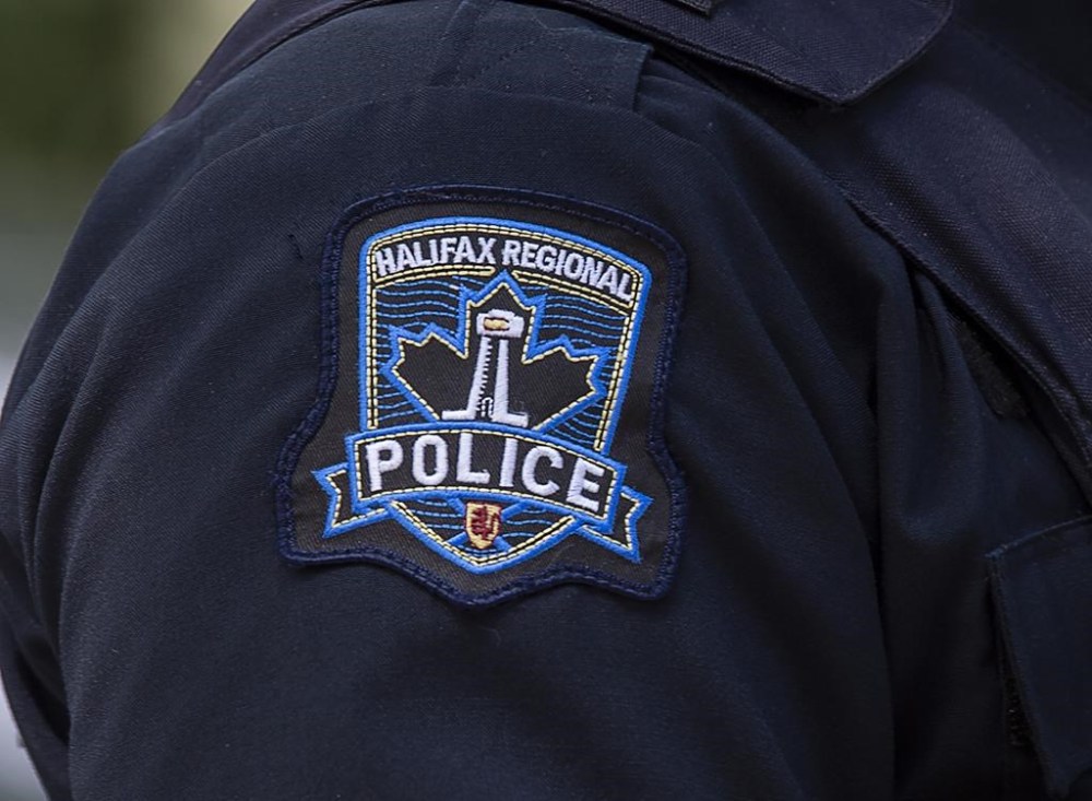 Halifax Regional Police say a 17-year-old male faces a manslaughter charge following a homicide on the city’s waterfront earlier this month. A Halifax Regional Police emblem is seen as police officers attend a murder scene in Halifax on Thursday, July 2, 2020. THE CANADIAN PRESS/Andrew Vaughan