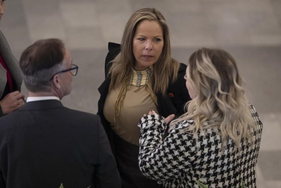 'Freedom Convoy' organizer Tamara Lich (centre) and follow convoy organizer Chris Barber are scheduled to stand trial in Ottawa . (Jason Franson / The Canadian Press files)