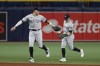 New York Yankees' Aaron Judge, left, celebrates with Harrison Bader after the Yankees defeated the Tampa Bay Rays in a baseball game Friday, Aug. 25, 2023, in St. Petersburg, Fla. (AP Photo/Scott Audette)