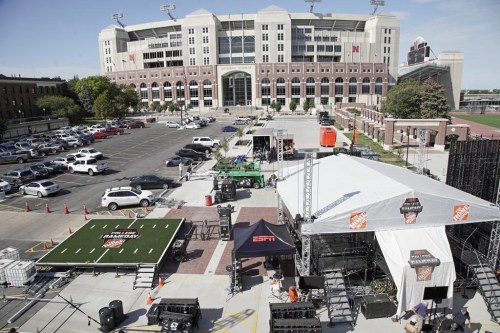 FILE - Workers set up the ESPN 
