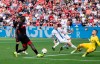 Leverkusen's Victor Boniface, left, scores, during the German Bundesliga soccer match between Bayer Leverkusen and SV Darmstadt, at the BayArena in Leverkusen, Germany, Saturday, Sept. 2, 2023. (Bernd Thissen/dpa via AP)