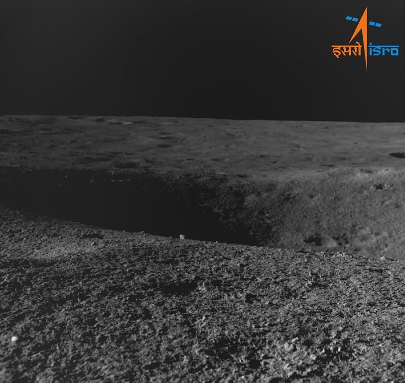 This image provided by the Indian Space Research Organisation shows a crater encountered by Chandrayaan- 3 as seen by the navigation camera on Aug. 27, 2023. India