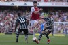 Arsenal's Declan Rice, center, is challenged by Manchester United's Casemiro, left, and Alejandro Garnacho during the English Premier League soccer match between Arsenal and Manchester United at Emirates stadium in London, Sunday, Sept. 3, 2023. (AP Photo/Kirsty Wigglesworth)