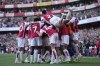 Arsenal players celebrate after teammate Gabriel Jesus scored his side's third goal during the English Premier League soccer match between Arsenal and Manchester United at Emirates stadium in London, Sunday, Sept. 3, 2023. (AP Photo/Kirsty Wigglesworth)