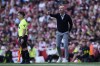 Manchester United's head coach Erik ten Hag, right reacts during the English Premier League soccer match between Arsenal and Manchester United at Emirates stadium in London, Sunday, Sept. 3, 2023. (AP Photo/Kirsty Wigglesworth)