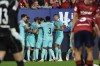 Barcelona's Jules Kounde is congratulated after scoring his side's opening goal during Spanish La Liga soccer match between Osasuna and Barcelona at El Sadar stadium in Pamplona, Spain, Sunday, Sept. 3, 2023. (AP Photo/Alvaro Barrientos)