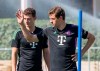 Bayern Munich's Benjamin Havard, left, and Thomas Muller attend a training session with his team at the club grounds in Munich, Germany, Monday Aug. 22, 2023. (Peter Kneffel/dpa via AP)